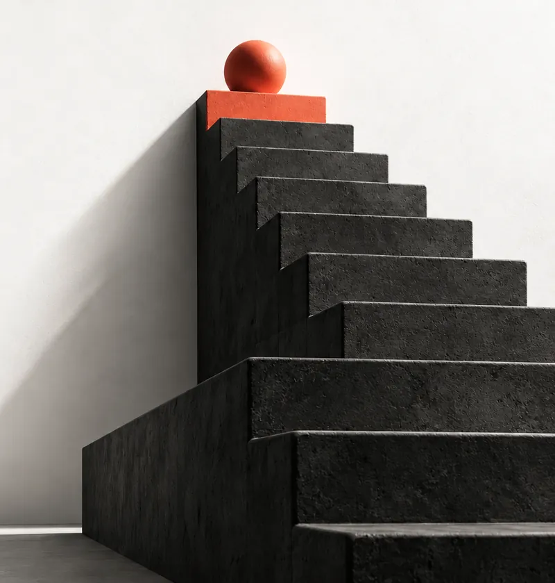 Un escalier de béton noir monte vers une marche corail, avec une boule corail tout en haut.